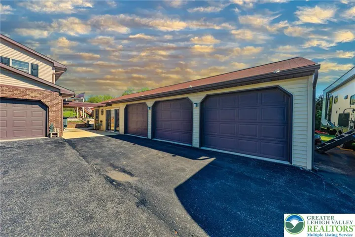 Detached 3 car garage and recreation room