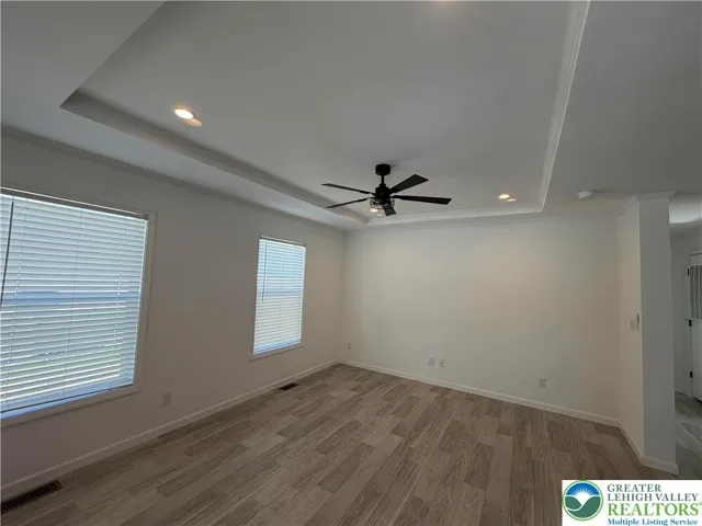 Living Room with Tray Ceiling
