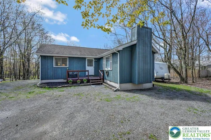 The home features a newer 66sf front deck--ideal for morning coffee.
