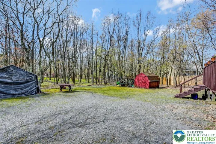 Step off the deck and enjoy the large yard which includes a storage shed for outdoor furniture and lawn care equipment.
