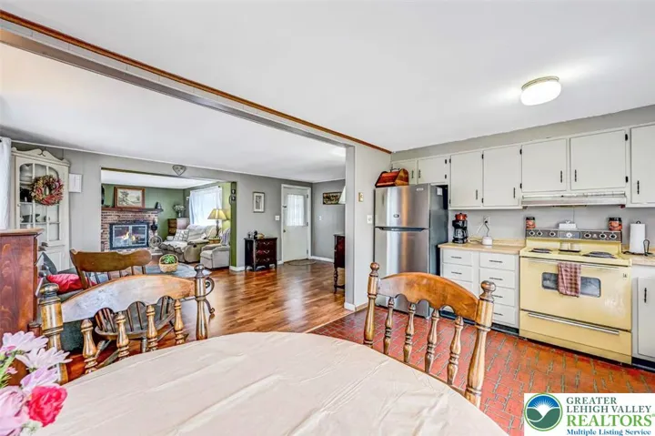The Dining Area is off the Kitchen & overlooks the Living Room and Family Room.
