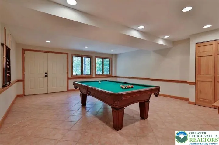 Basement family room/game room *virtually staged