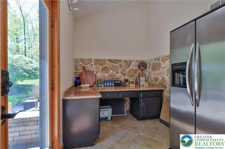 Butler's pantry with second refrigerator