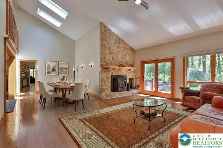 Formal living room adjacent to the formal dining room.  *dining furniture virtually staged