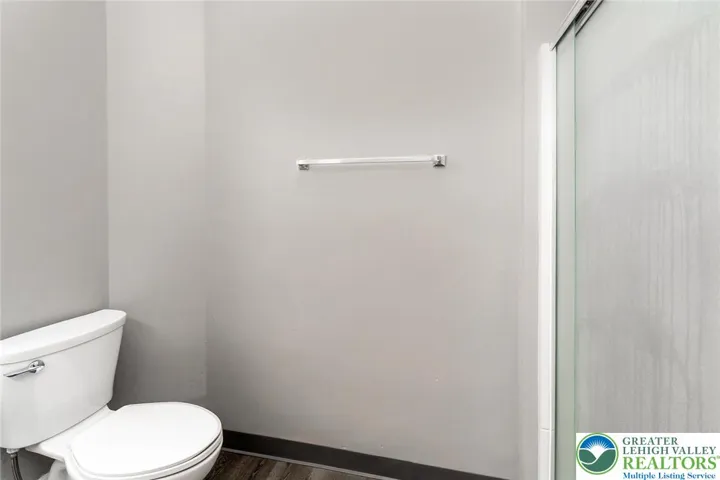 Full bathroom by Laundry room