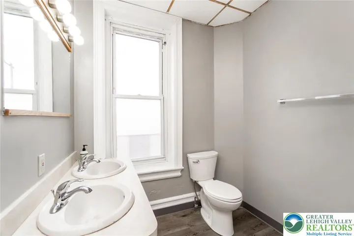 Full bathroom by Laundry room