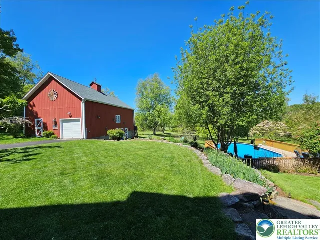 Barn and pool (stalls on lower side)