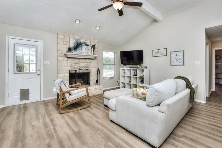 Beautiful open and bright family room; Recent luxury vinyl flooring