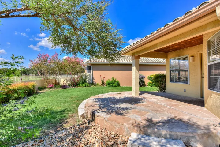 Grassy area  behind the rear covered patio....