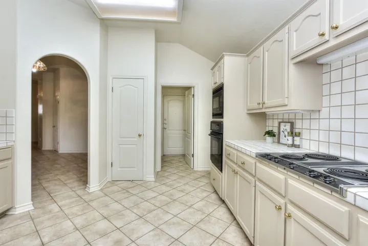 Another view of the kitchen.  The doorway in the center of this photo leads to the utility room....