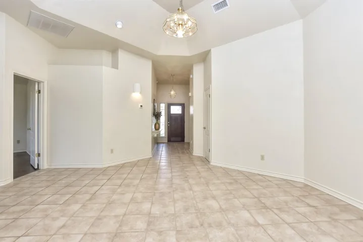 If this was MY home, I would make this formal dining room into another living area....but that's just me.  One for the ladies, one for the gents!