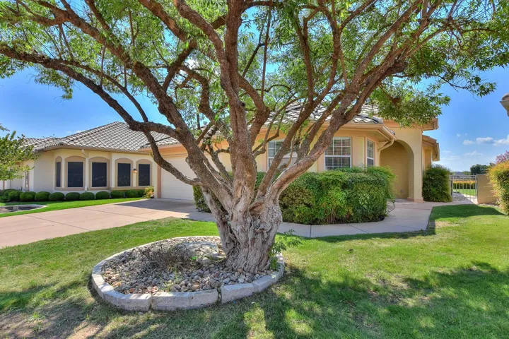 Front entry to your garden home....zero lot line...with a view of the golf course!