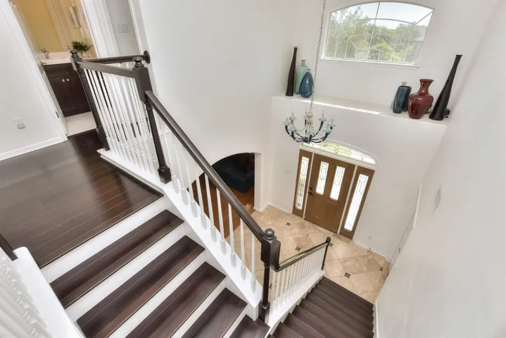 Here is a view of the stairway and landing from upstairs to the foyer.  Pretty....