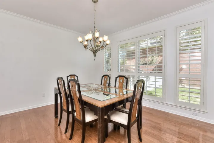 If you want to have sit down at the table meals, this room is accessible just off of the kitchen by a doorway.  Spacious & could easily seat 8 to 10 in this area...