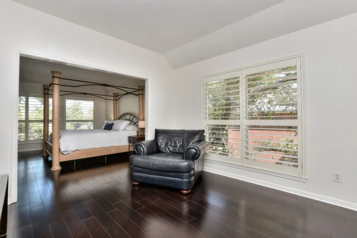 Flex room off of the Primary Suite.  This space could be used as a nursery, an exercise room, a TV room, a reading room OR this far all could be sheetrocked in to make this a 5th bedroom if you wanted.  This photo is from the door in the hall into the Primary Suite.  So, the Primary Suite actually has 2 entries at this time...