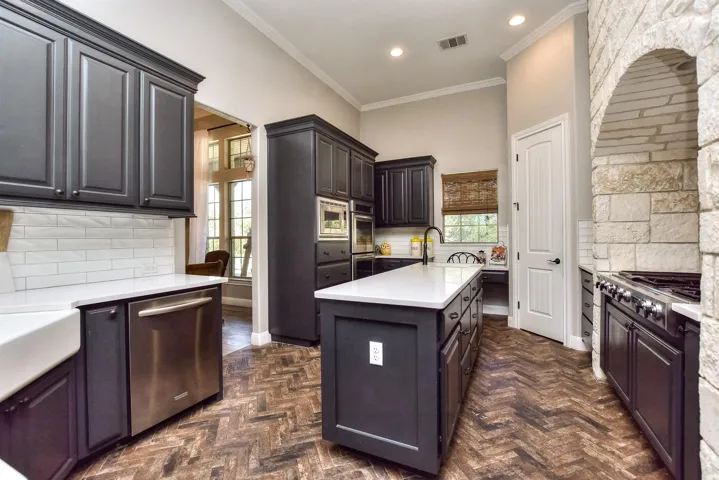 Brick flooring laid in Herringbone pattern 