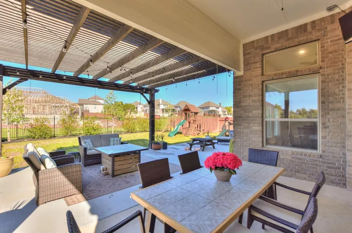 This lot offers a 10' easement to allow optimal privacy.  This photo shows the neighbors but shows the easement as well directly behind this lot.