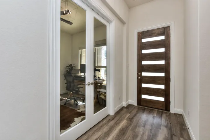 Beautiful entry and beautiful flooring;  This photo shows the Office/4th bedroom