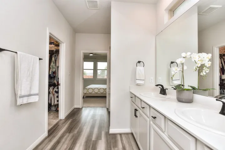 Dual vanities in primary bathroom
