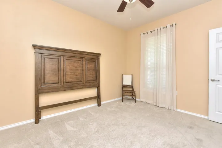 2nd bedroom in the front of the house is the perfect private bedroom for your guests...
