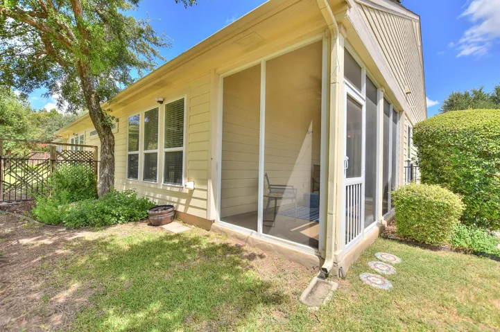 The screened in patio is the perfect place to enjoy your morning coffee while watching nature at it's finest in the side greenbelt.  Peace and tranquility reside here...