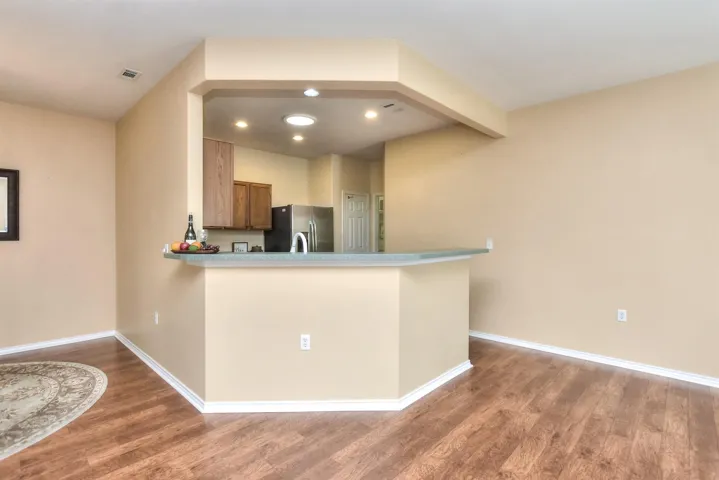 The breakfast bar could easily seat 3 to 4 if you want visitors while you cook!