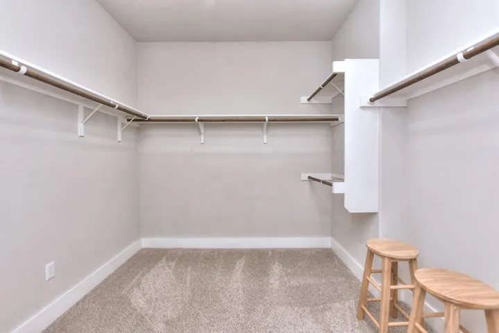 Primary walk-in closet...