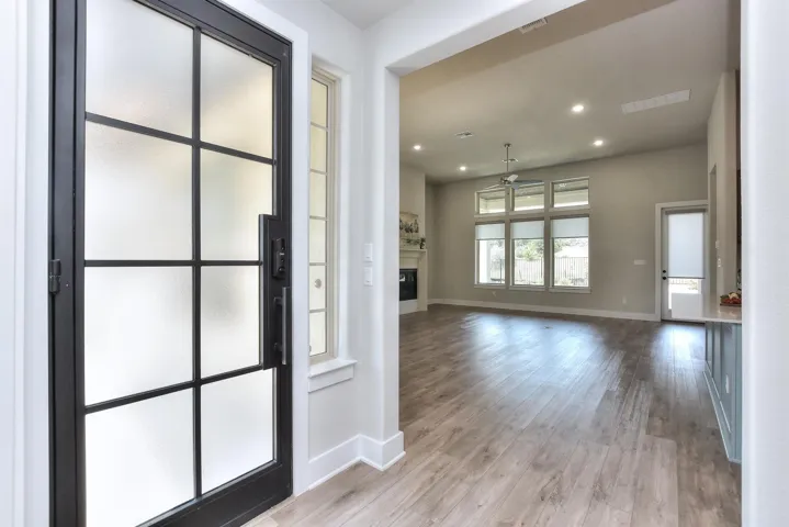 Come on in...Muted glass front door makes for a beautiful entryway....
