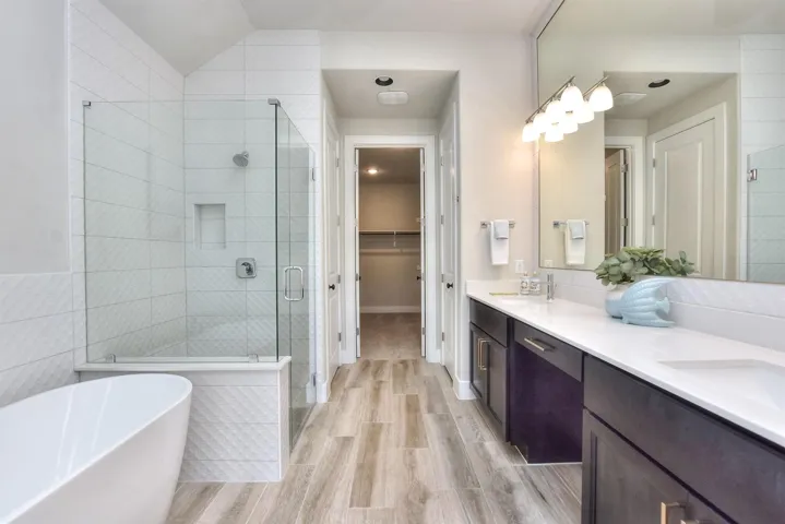 Primary Bathroom...free standing soaker tub, separate shower, makeup vanity & dual sink vanities, plus large walk-in closet...