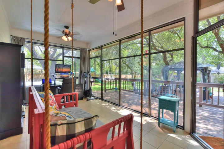 Beautiful Sun room with wall of Windows