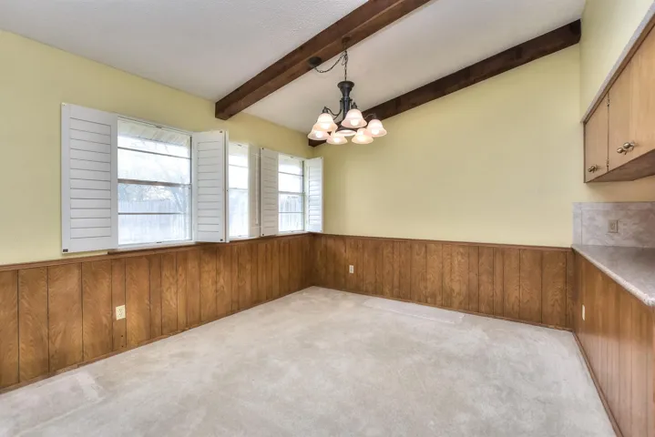 Large dining area off kitchen and open to living