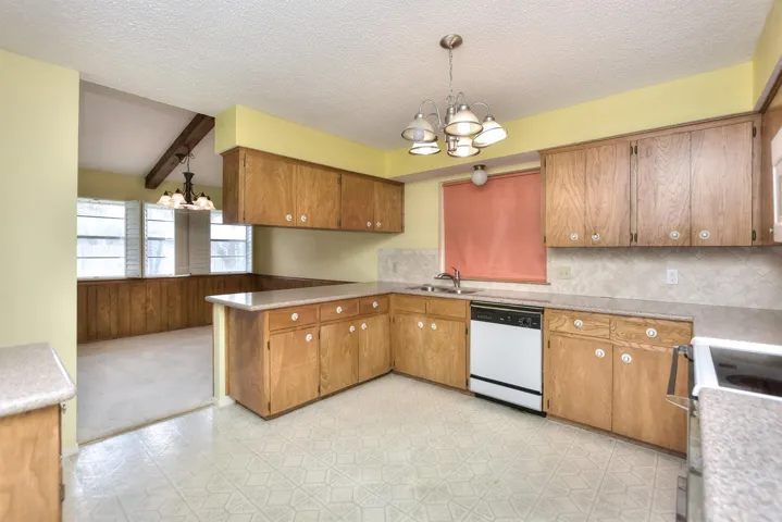 Kitchen opens to dining area...remodel it to your ideal space