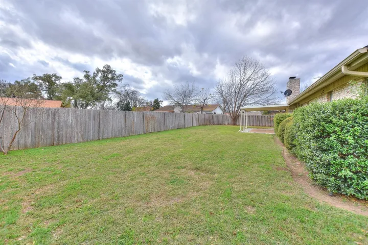 Big back yard offers plenty of room for a pool