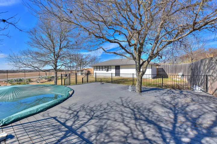 This photo taken January, 2025;  Pool covered for the Winter Months