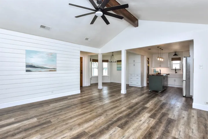 Vaulted Beam Ceilling;  Luxury Vinyl Flooring THROUGHOUT.... No Carpet