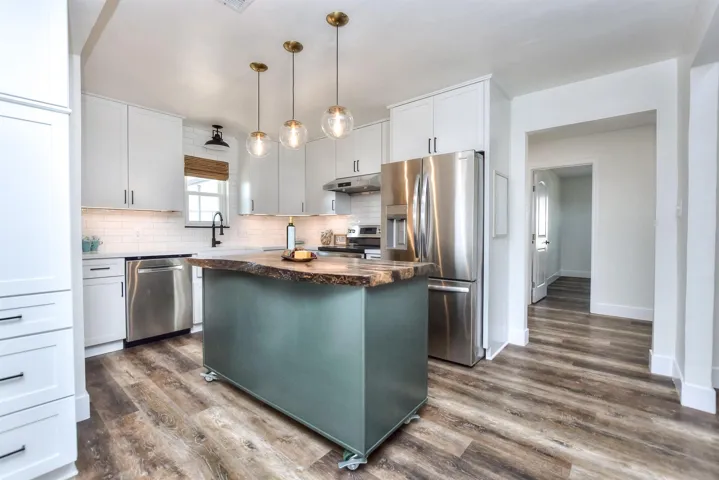 Outstanding Kitchen Remodel; Great view of the Live Edge Pecan Slab Island