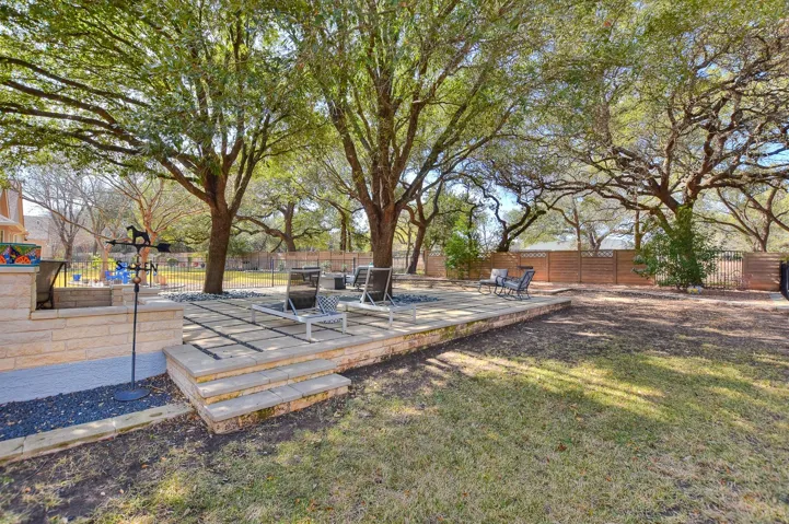 Grassy area for your pup(s).  If you want more grass, you can add it to the area just behind this grassy area.  We left it natural for your choice....