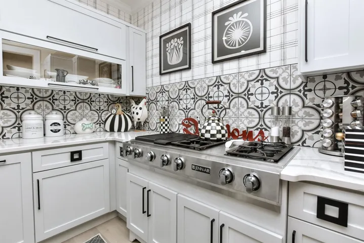 Bring your own cooking to the fabulous kitchen with a Jenn-Air gas cooktop, great counterspace, designer pulls, you name it.  And, right behind you in the center island is a very convenient, built-in spice cabinet...