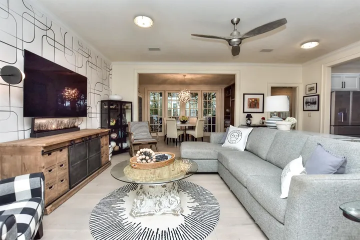 So inviting...at the end of this room is the dining room with a wall of paned doors leading to the fabulous back yard...