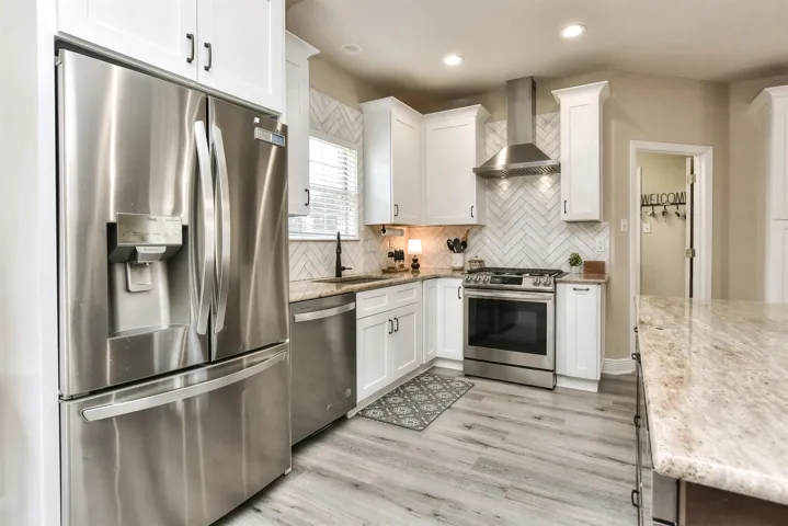 Recent kitchen remodel including cabinets, counter tops, appliances, kitchen sink and much more