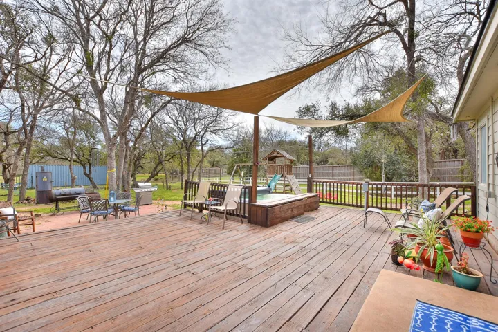 Incredible park-like backyard with party deck