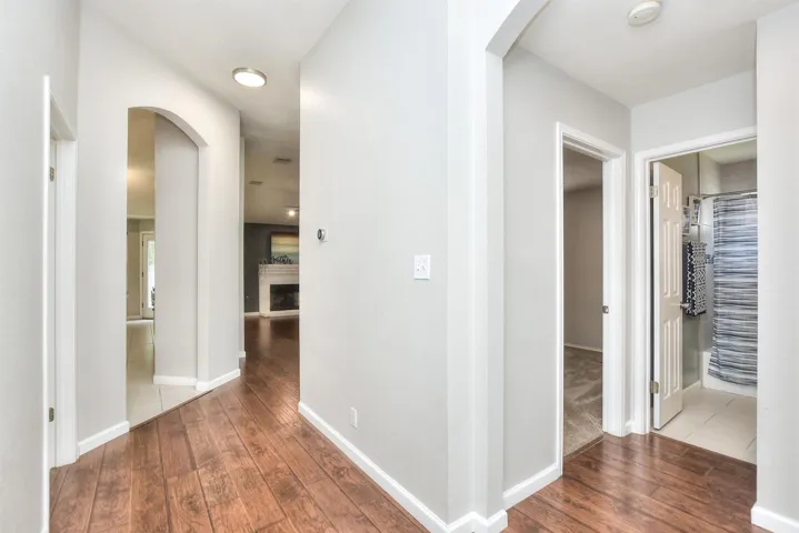 Lovely, sturdy wood look laminate flooring throughout the living spaces