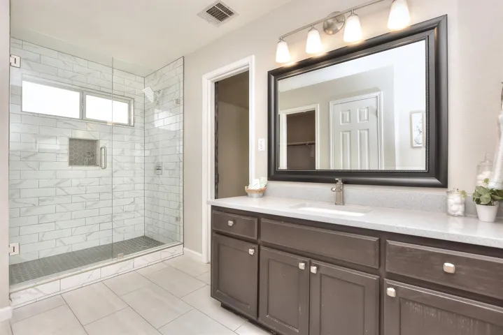 Primary bath with updated tiled walk-in shower!