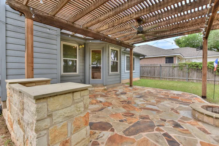 Custom stone surround fits most BBQ grills and offers space on either side for your cooking tools and trays!