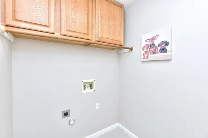 Utility room with built in cabinets