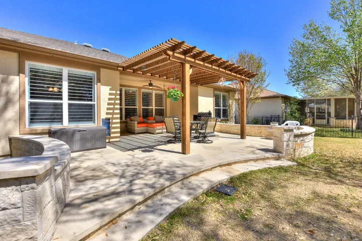 View of patio / terrace with outdoor lounge area, a pergola, fence, and ceiling fan