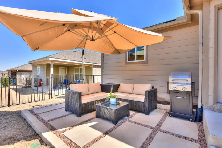 View of patio featuring an outdoor hangout area