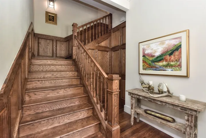 Stairway with wood finished floors