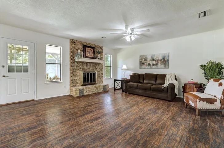 Open spacious family room; wood burning fireplace