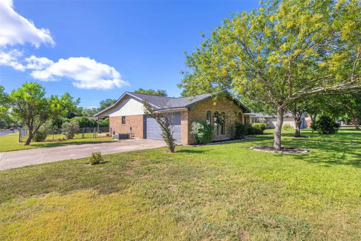 Convenient corner lot with side entry garage